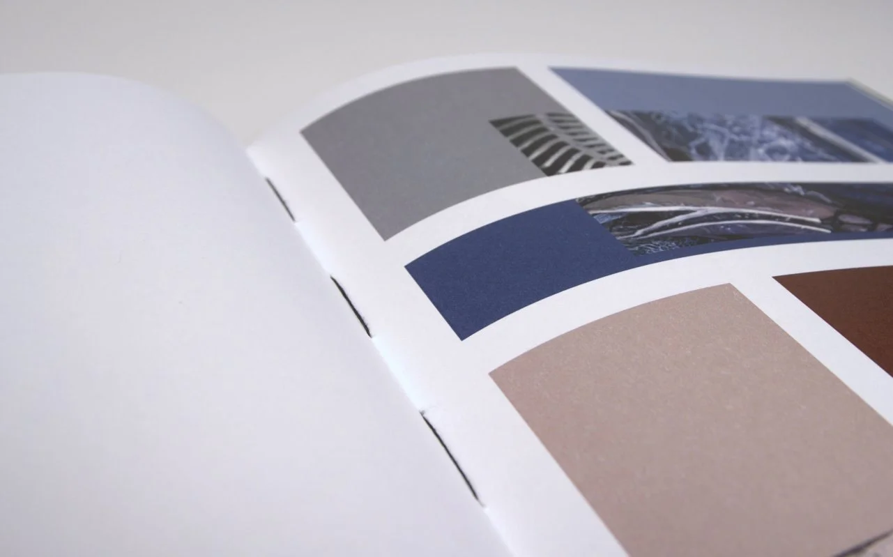 Color palette spread with stitched binding visible: six colour swatches drawn from the collections